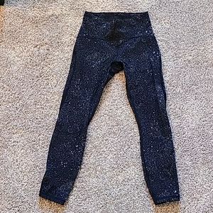 Lululemon Wunder Train High-Rise Tight 25" size 6, black with blue splatter